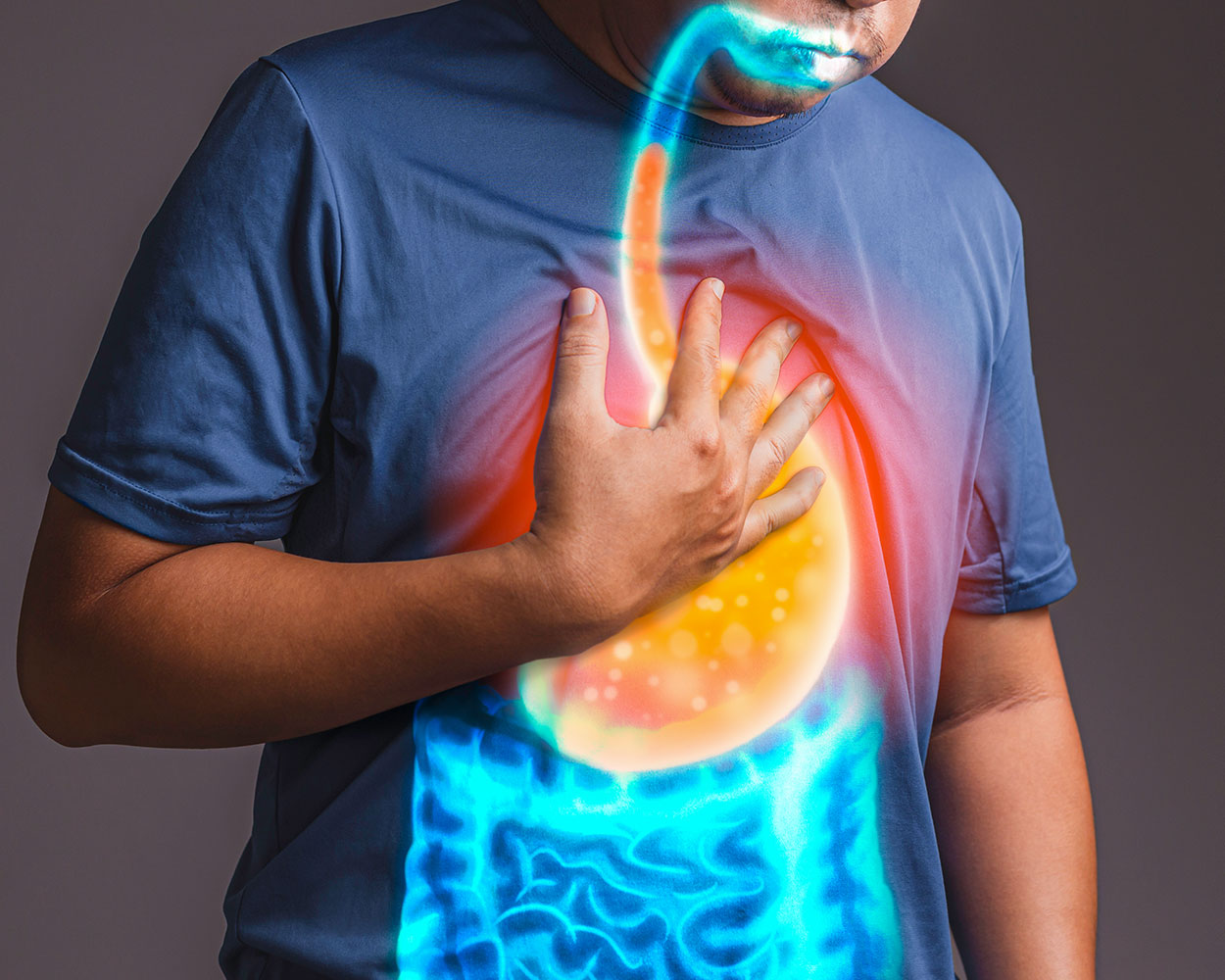 Person experiencing heartburn relief - natural heartburn remedies